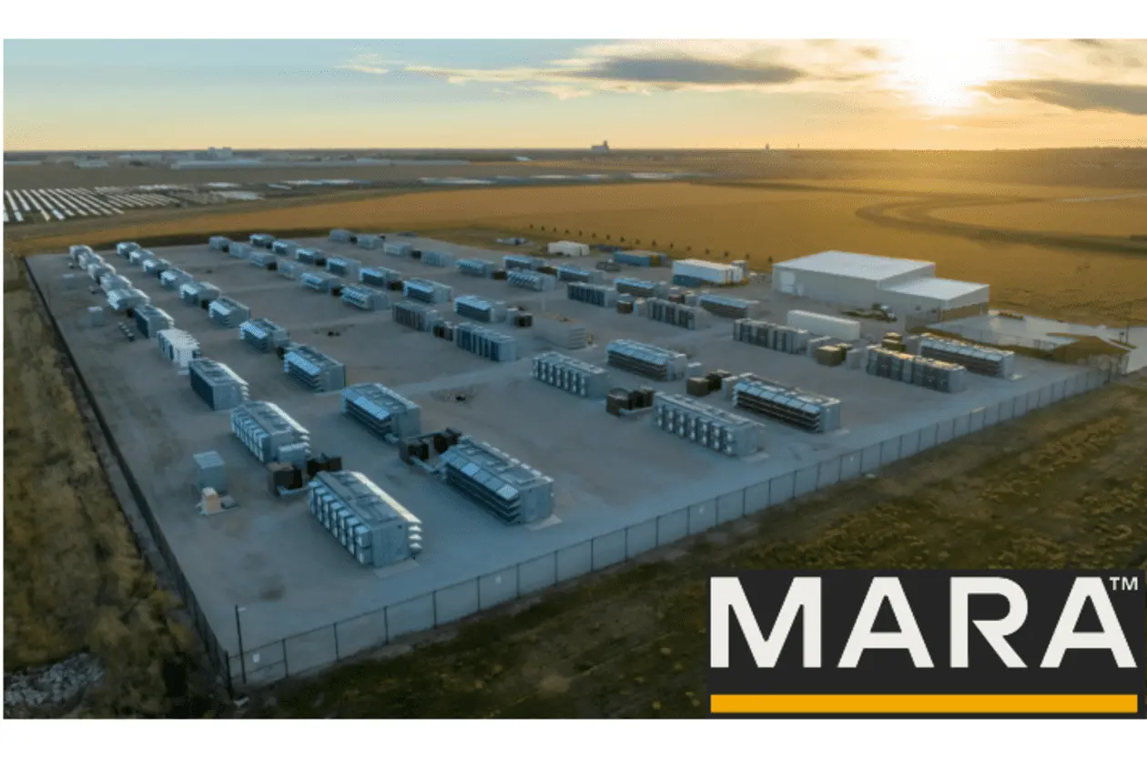 Aerial view of a MARA Bitcoin mining facility featuring rows of cooling containers at sunset
