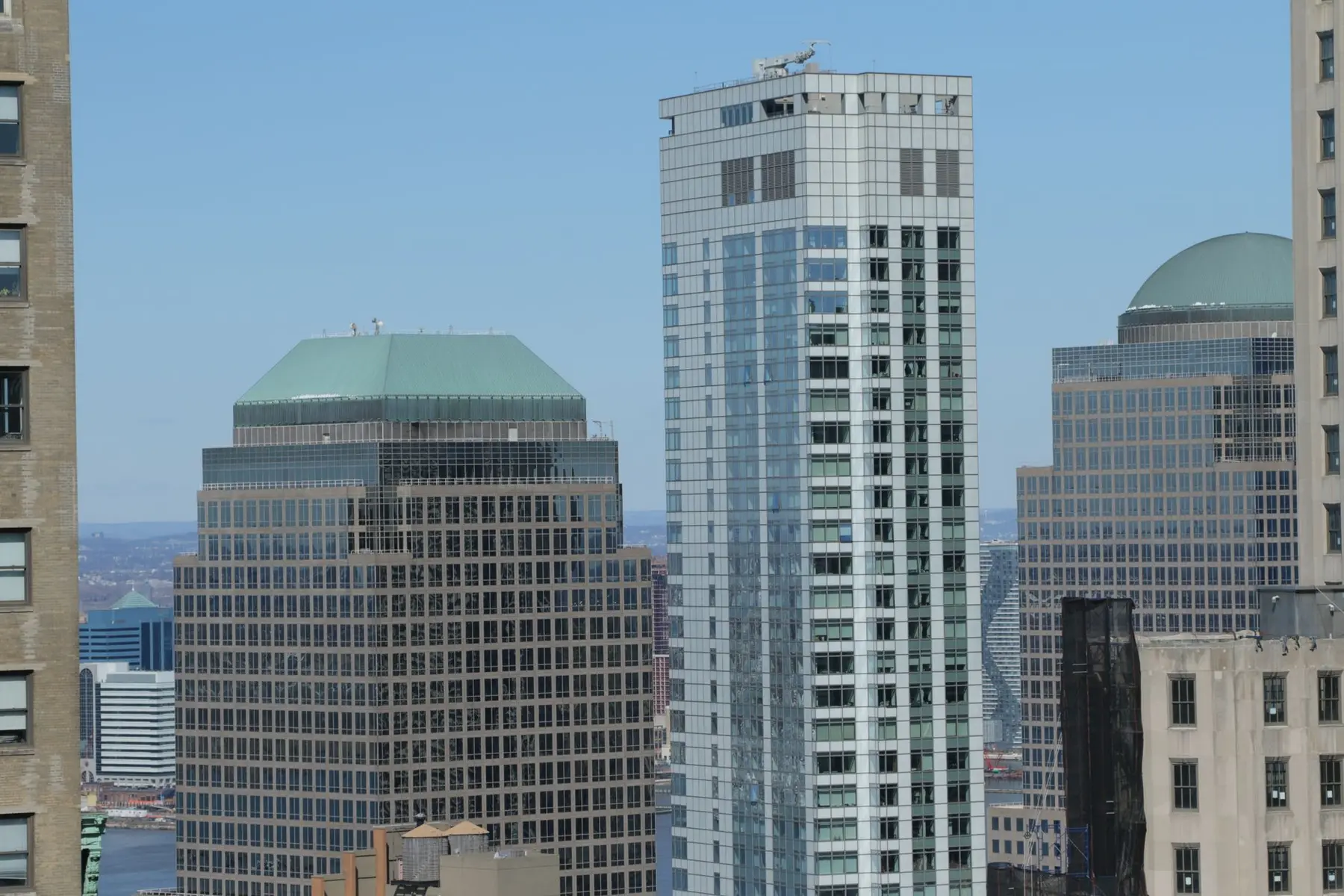 Exterior view of the BlackRock headquarters skyscraper and surrounding office buildings in New York City.